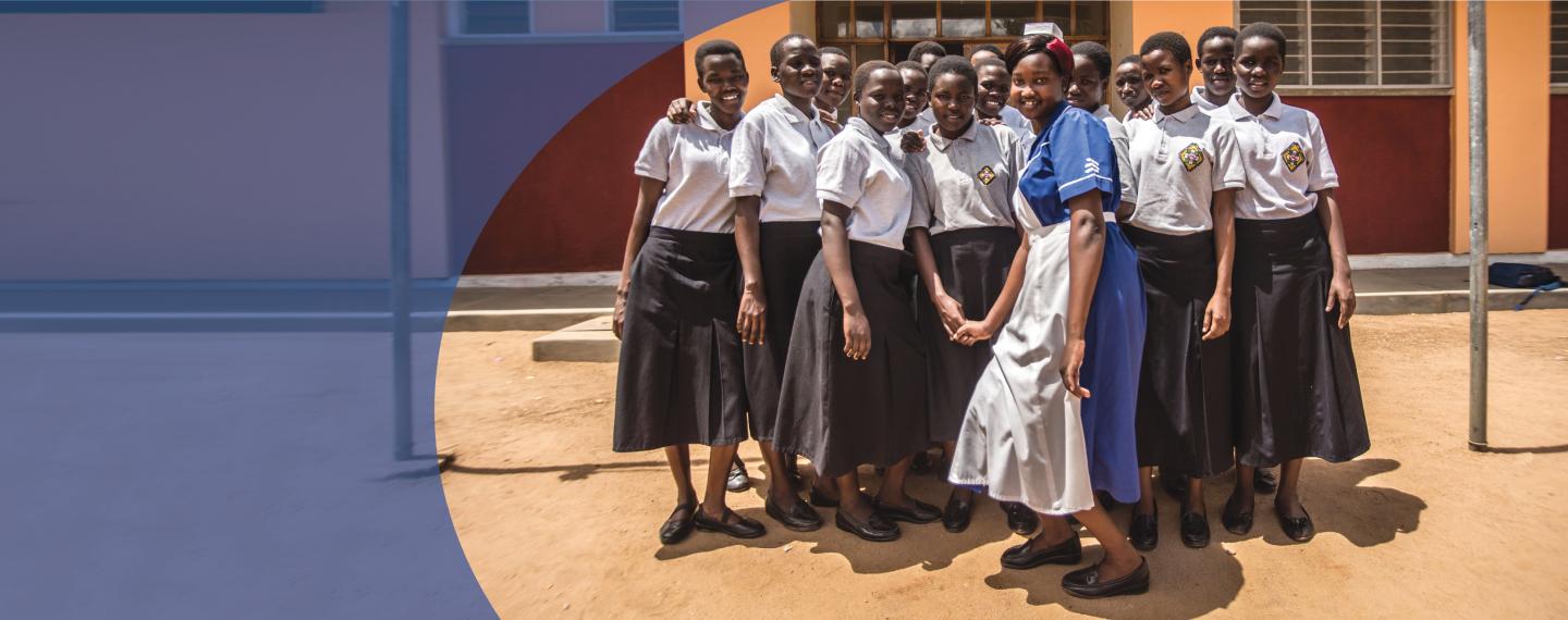 IntraHealth International: The future of global health starts here. 40 years. 100 countries. And an unwavering commitment to health workers. Photo of a group of about 20 young women who are nursing students in Uganda, whose education was supported by IntraHealth.