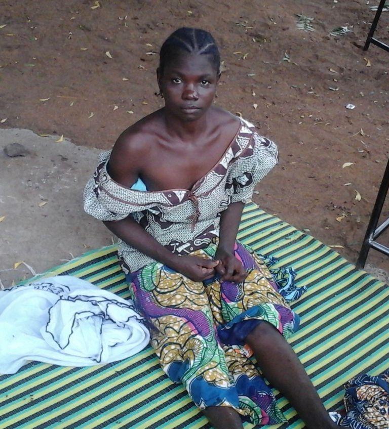 Now that Mariam has begun her postsurgery recovery, she spends much of her day sitting under a shade tree with the community health agents and the other fistula patients. Photo courtesy of AMCP.