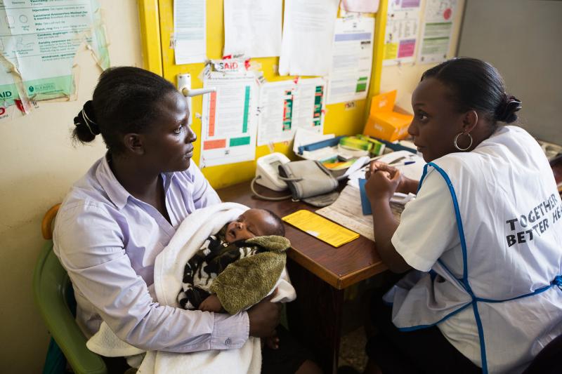 A woman undergoes cervical cancer screening for the first time in Kenya.