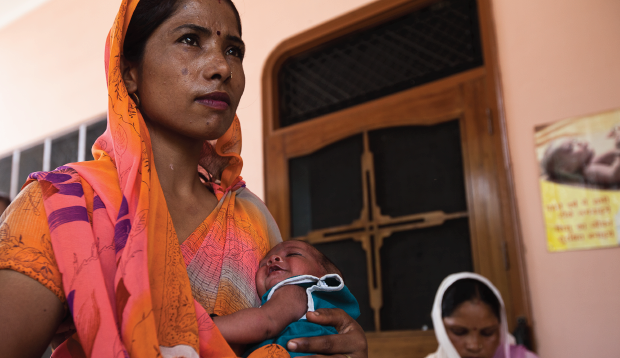 Mom and baby seeking care in rural India