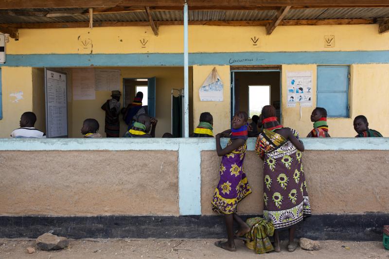 People wait to be seen by the nurse-in-charge at Kangalita Dispensary in Turkana. Kenya