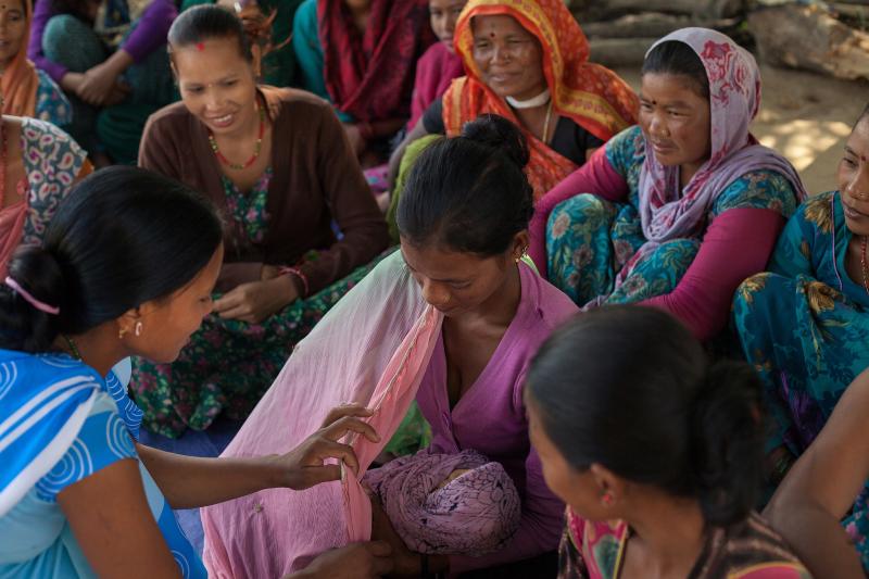 health worker with mothers