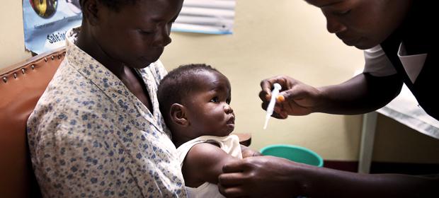 child receiving vaccine