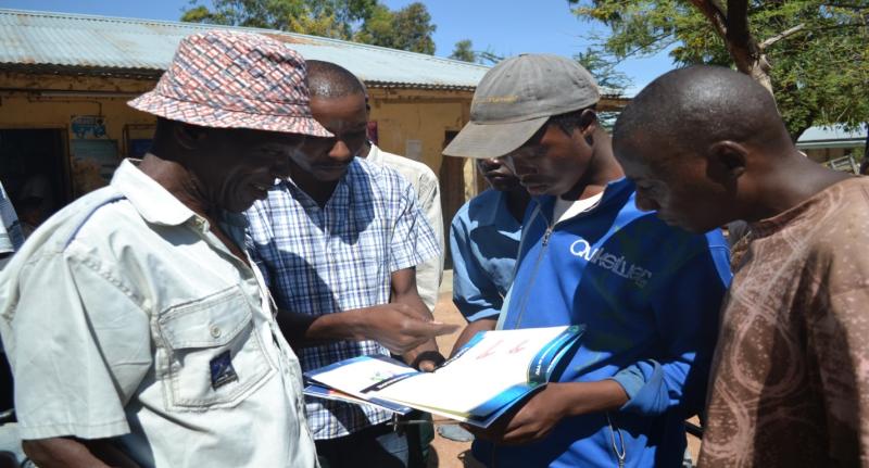 men at community outreach site