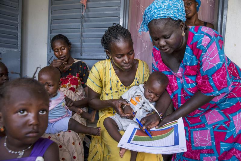 health worker and client in Senegal