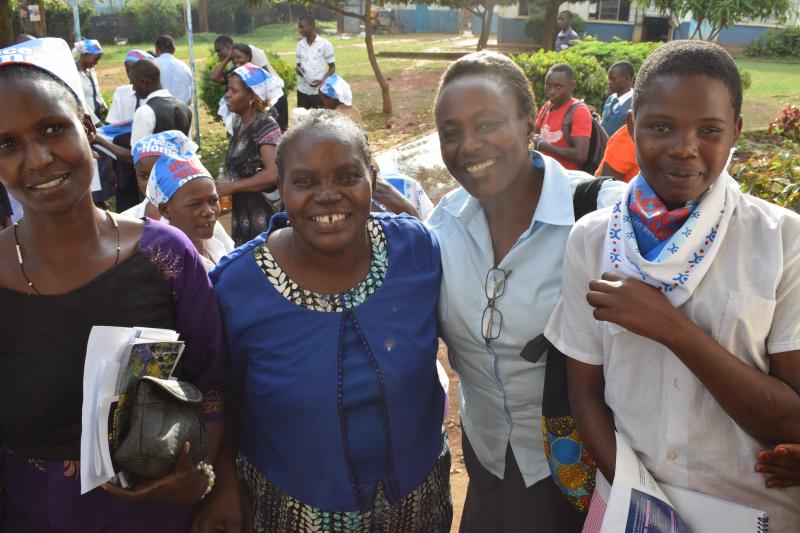 Sylvia with fellow teachers and a student