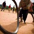 child playing with hoop