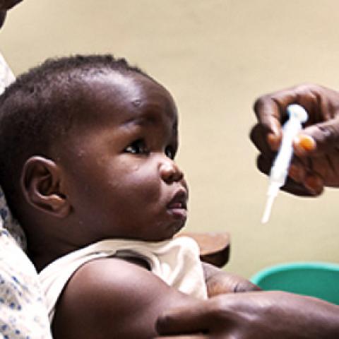 child receives vaccine