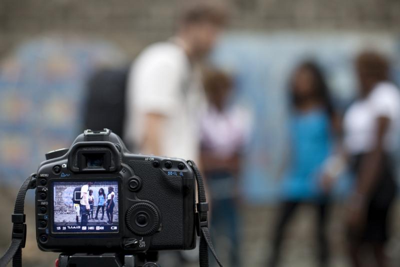 Filmmakers Saleem Reshamwala and David Hambridge shoot the students' music video. 