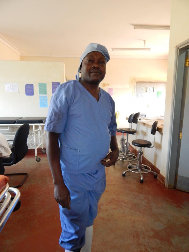 Dr. Satya in scrubs, ready to save the lives of a mother and child. Photo by Peter Sagabo.