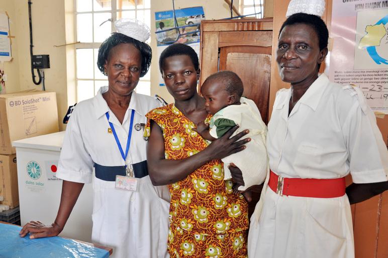 Habiba Shaban Agong, a client with her baby, and Nurse Connie Achar. Photo by Carol Bales.
