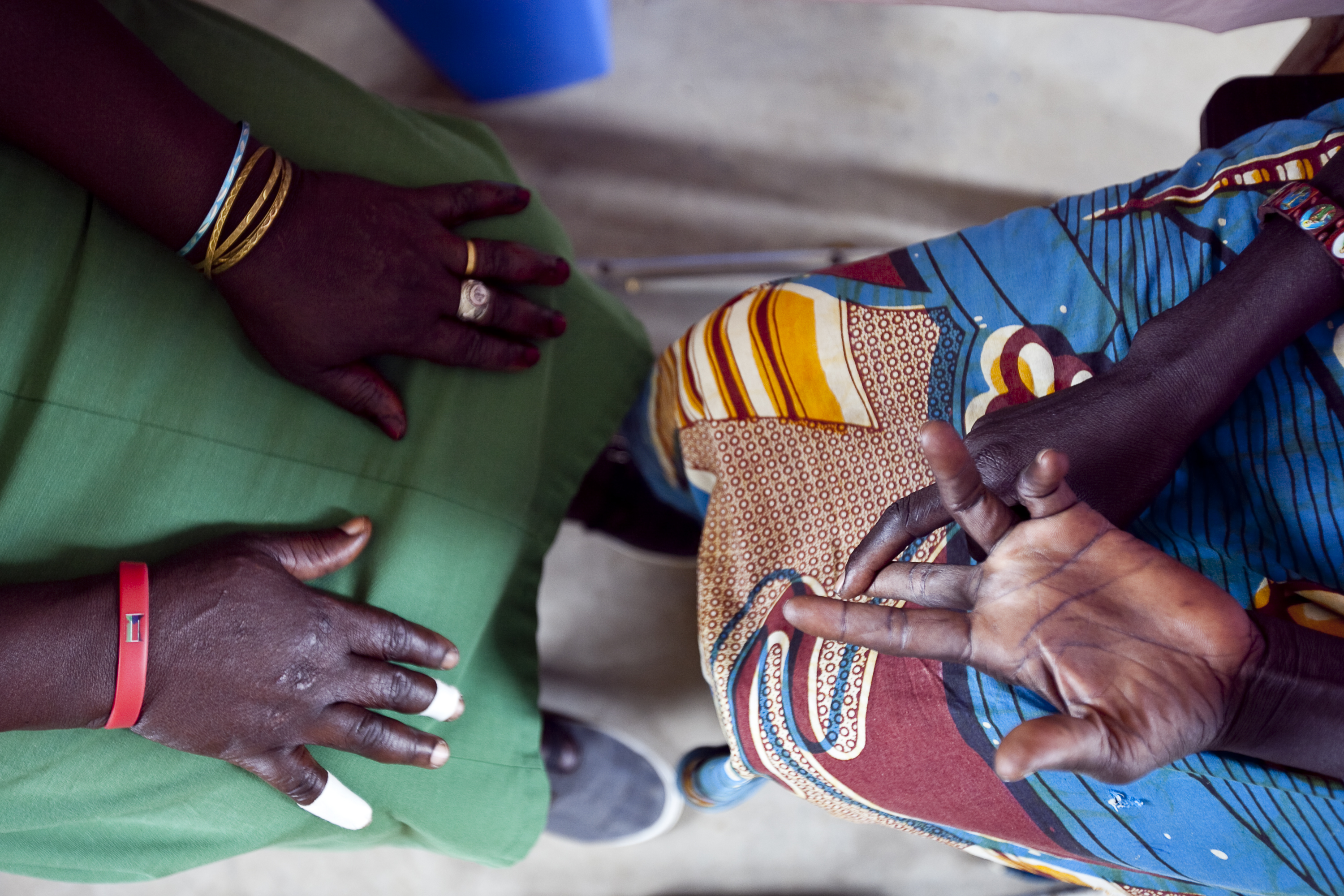 A health worker counsels a client at a Hospital in South Sudan. Photo by Trevor Snapp for IntraHealth International. 